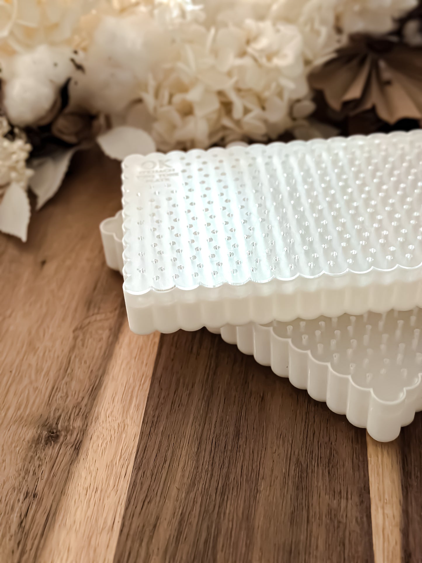 Two Tone Plates by O'Khach stacked, showing the textured surface for pressing fondant