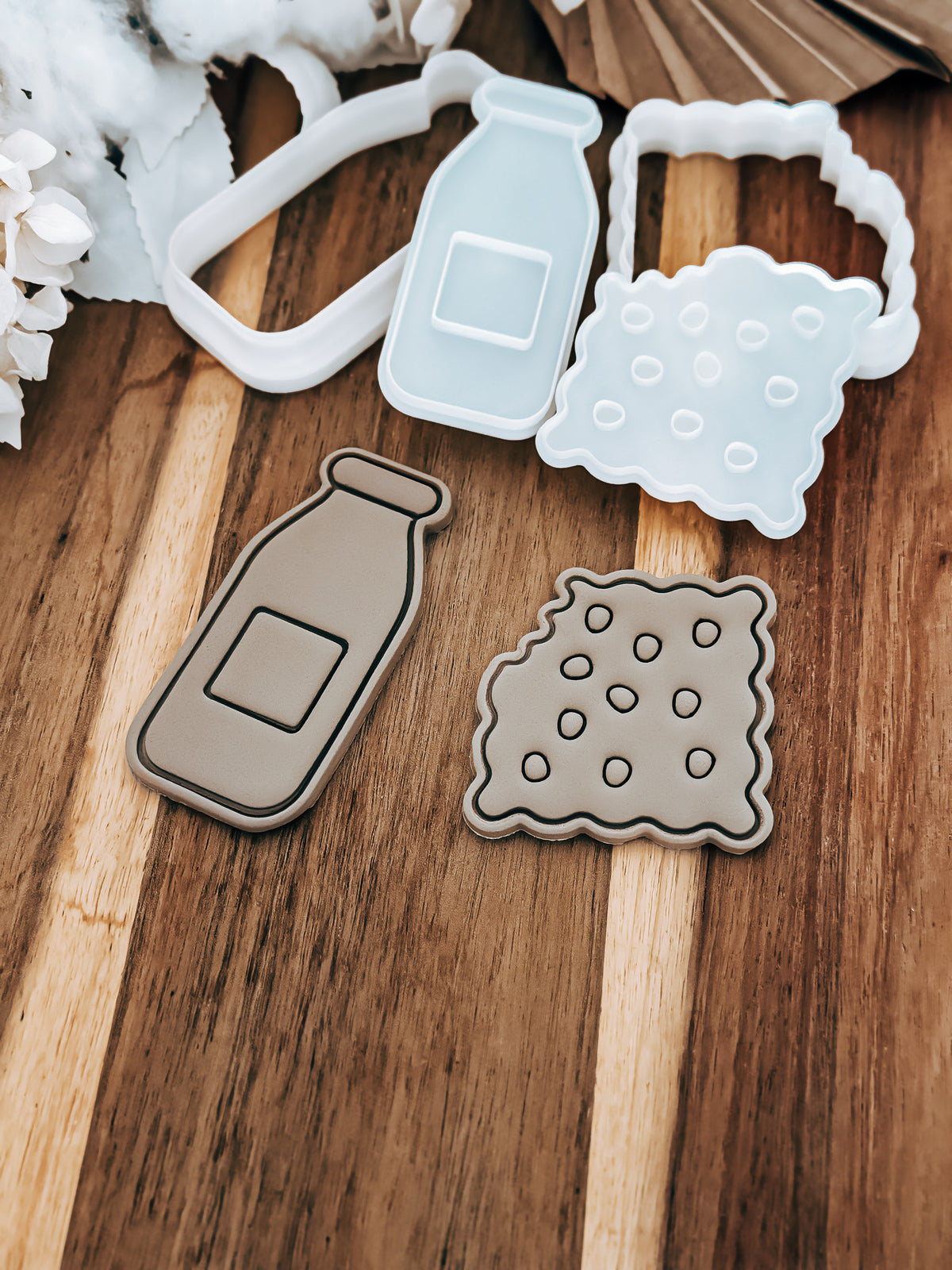 Milk & Cookie Set Christmas cookie stamp and cutter by O'Khach, shown stamped in fondant