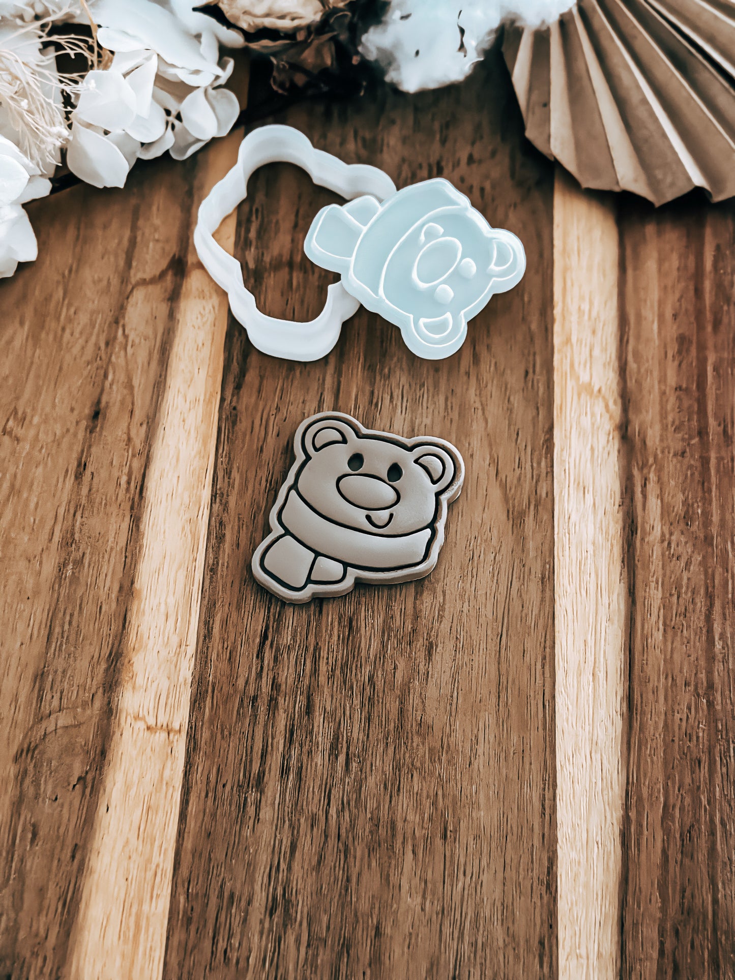 Mini Polar Bear Christmas cookie stamp and cutter by O'Khach, shown stamped in fondant