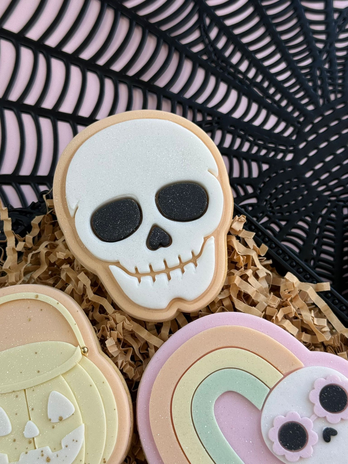Skull design stamped in fondant to show the finished cookie