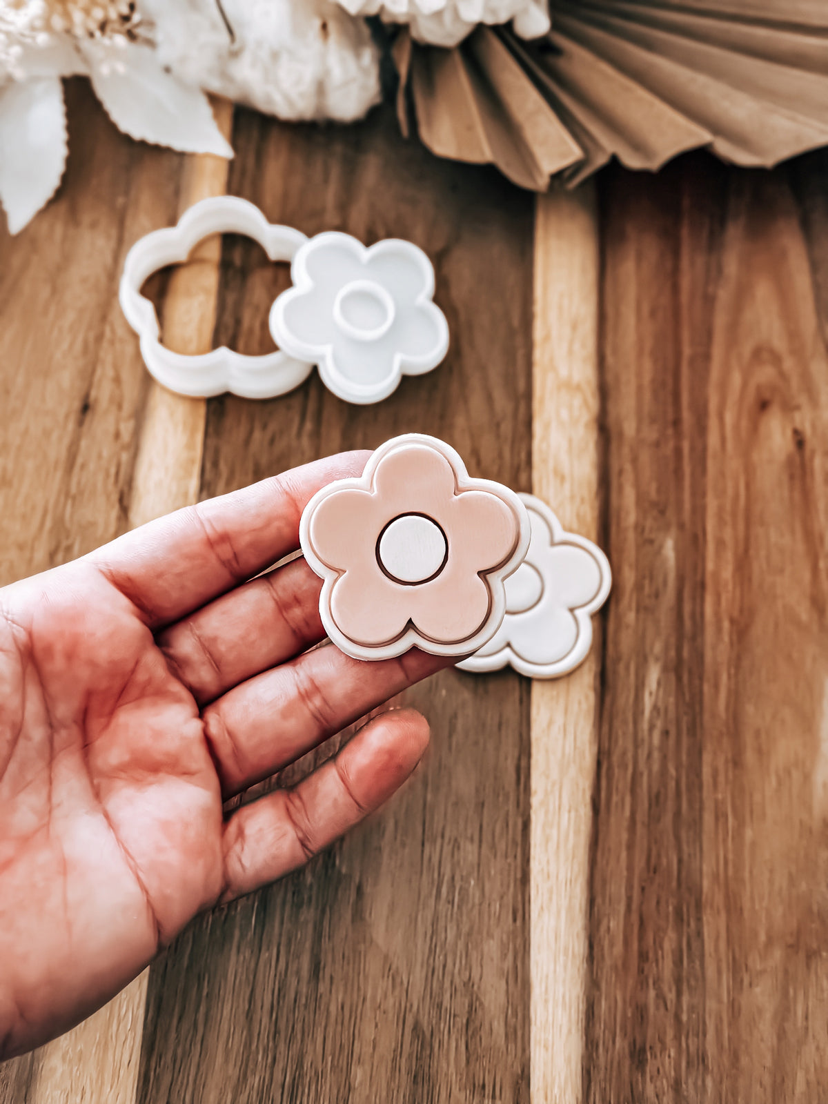 Mini Simple Daisy design stamped in fondant to show the finished cookie