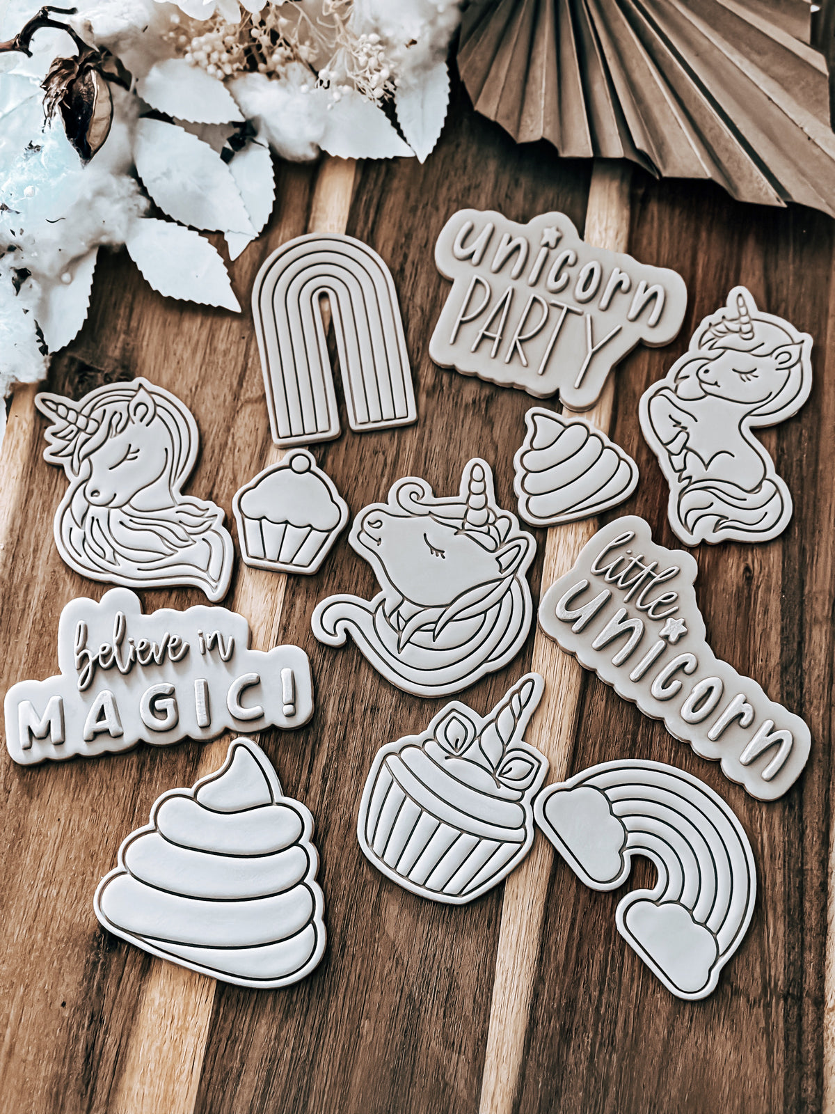 Full Unicorn (Glitter) design stamped in fondant to show the finished cookie
