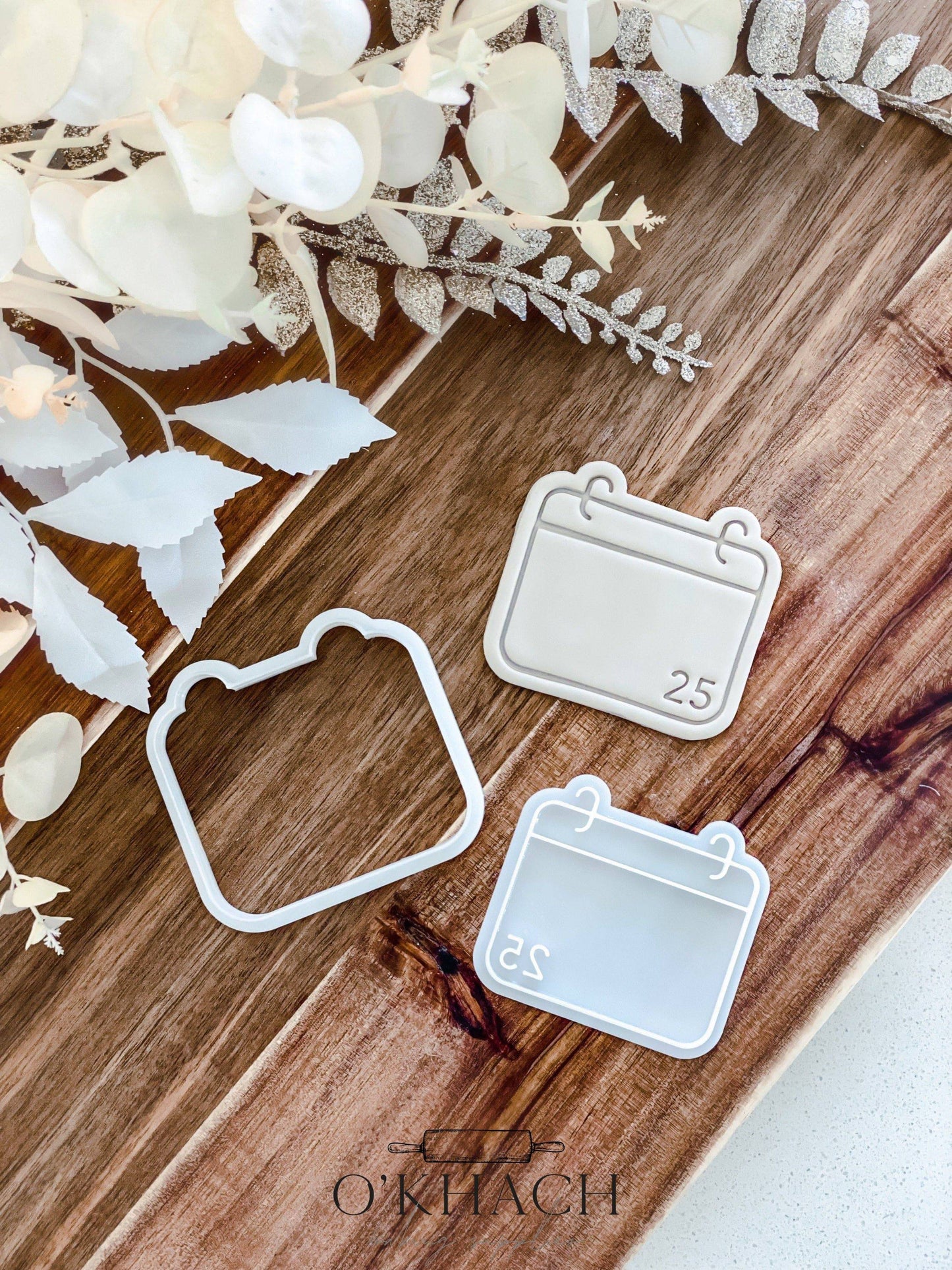 Christmas Calendar cookie stamp and cutter by O'Khach, shown stamped in fondant