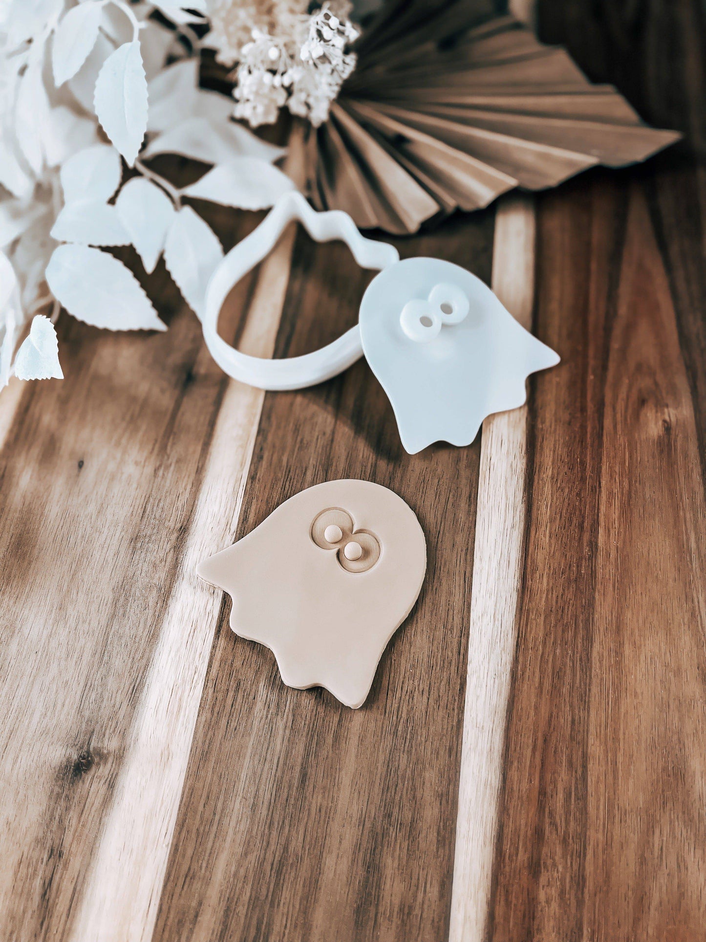 Ghost Halloween cookie stamp and cutter by O'Khach, shown stamped in fondant