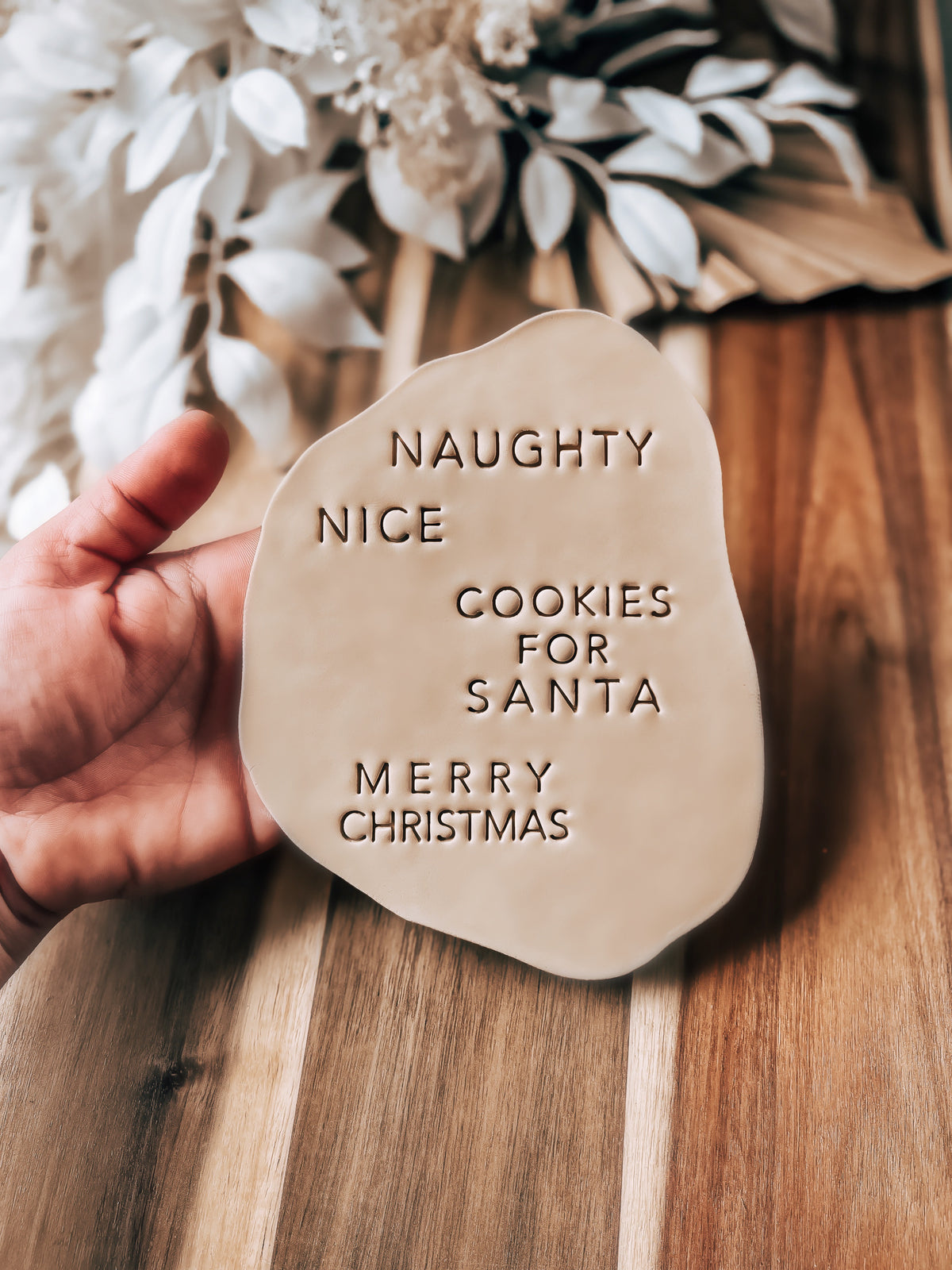 Christmas Cookie Stamps Set of 4 by O'Khach, shown stamped in fondant