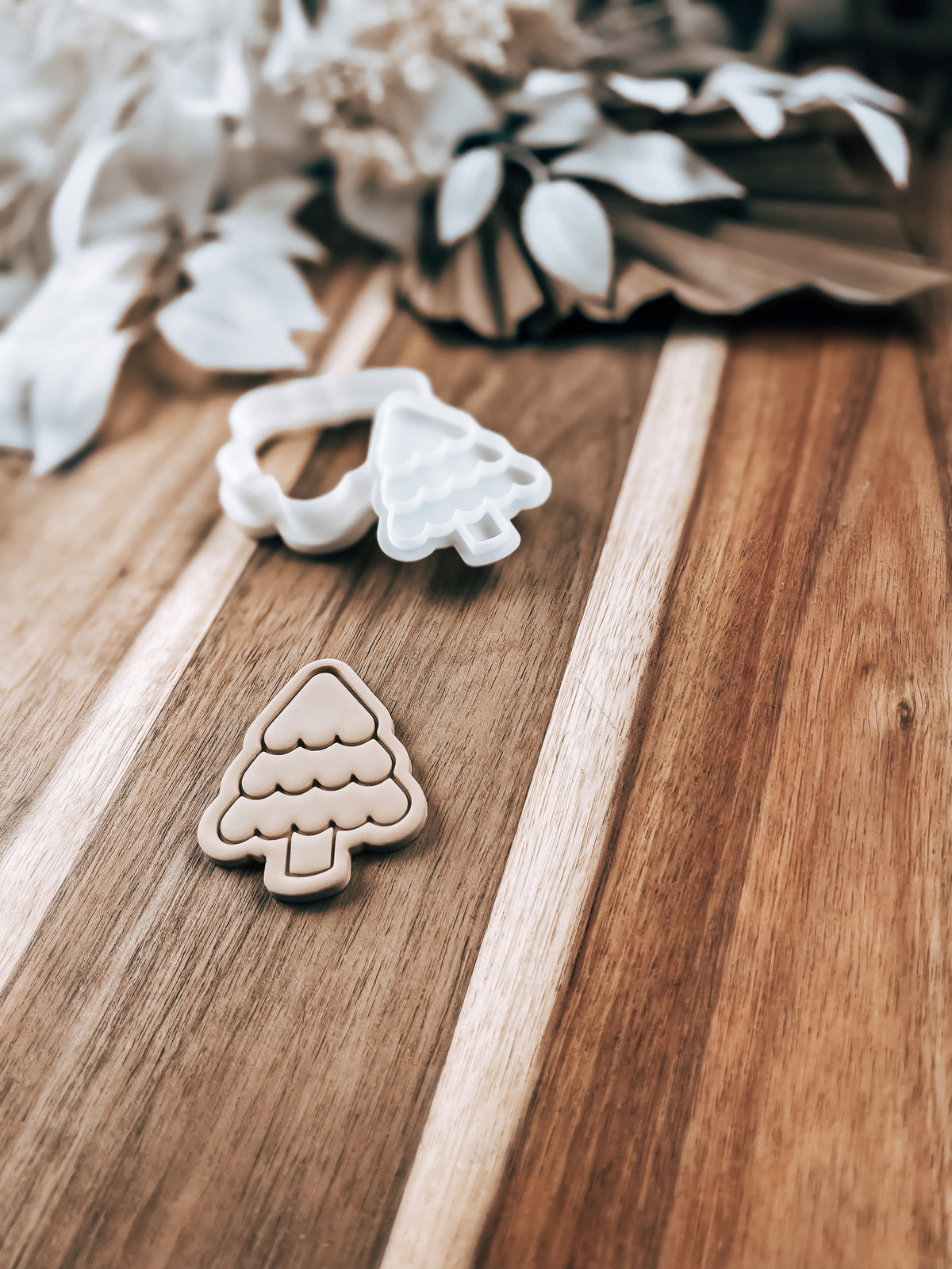 Mini Christmas Tree design stamped in fondant to show the finished cookie