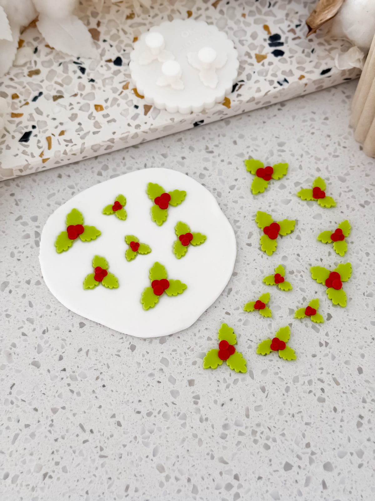 Green and red fondant mistletoe made with the Two Tone Press mould by O'Khach Baking Supplies