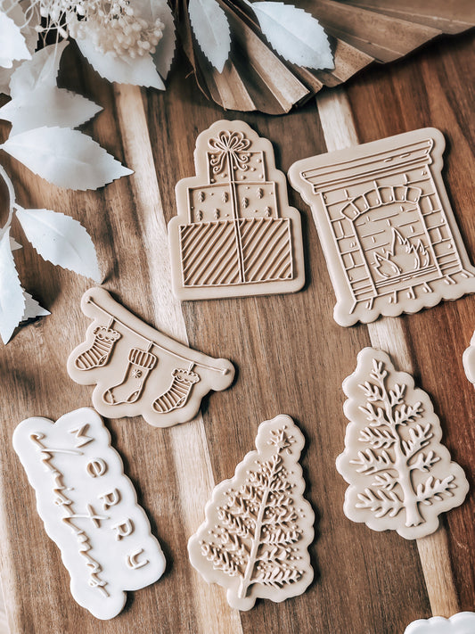 Snowy Christmas Tree 'UP' design stamped in fondant to show the finished cookie